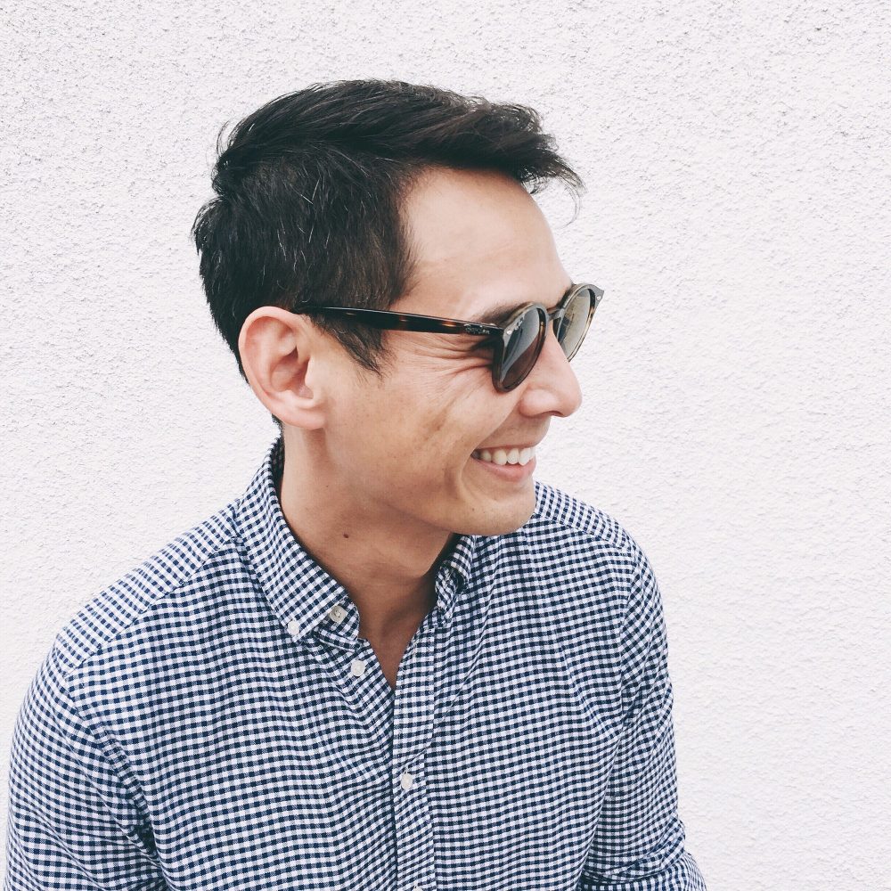 young-man-smiling-with-sunglasses.jpg